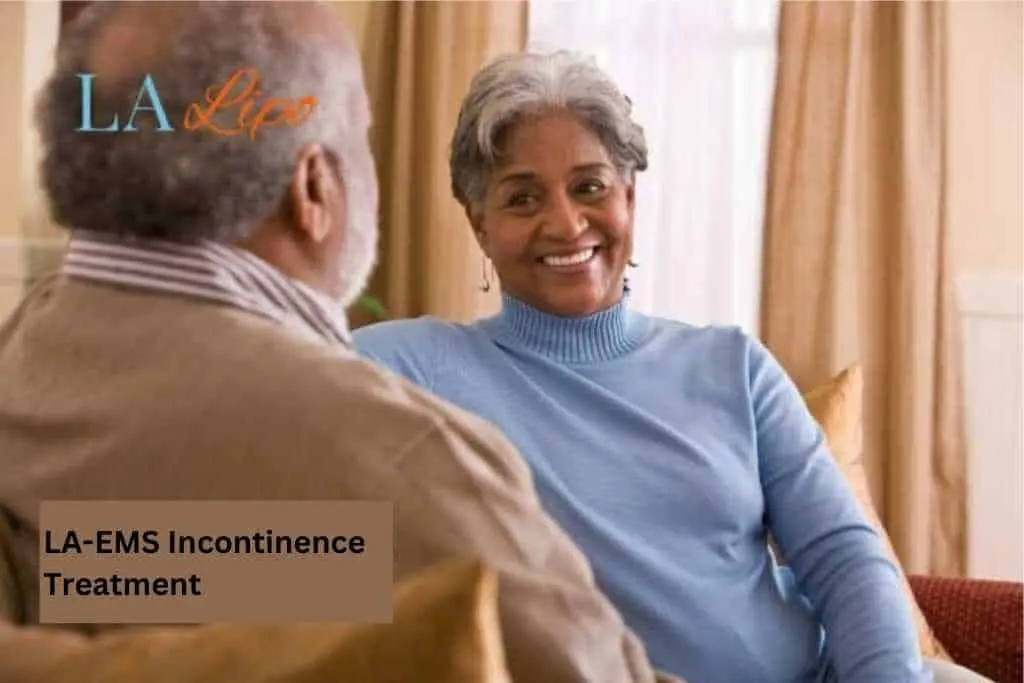 Couple sat smiling at each other - LA-EMS treatment Rickmansworth