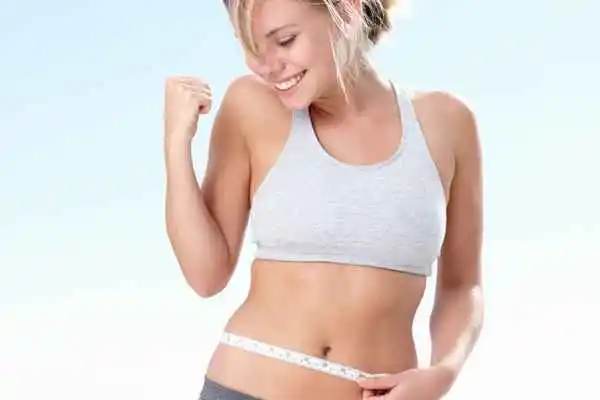 woman happy after fat reduction treatment Rickmansworth