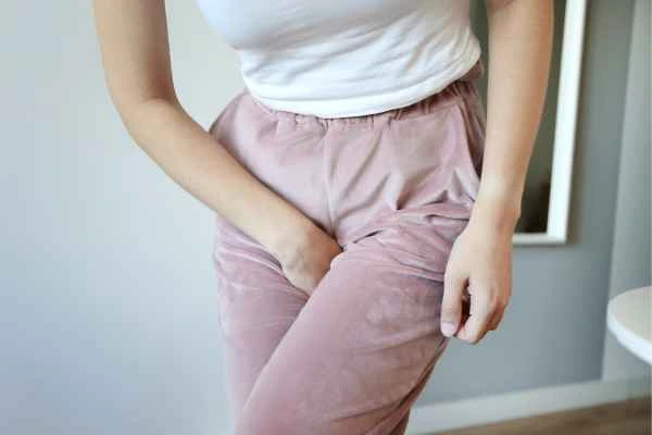 older woman running to the toilet because of urinary incontinence Rickmansworth