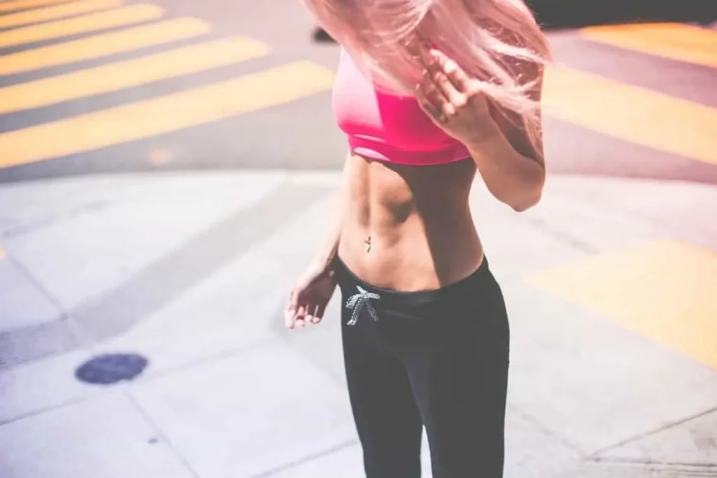 Woman with toned stomach after LA-EMS Body Sculpting Treatment Rickmansworth